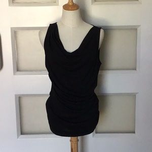 Cowl neck sleeveless ruched top.